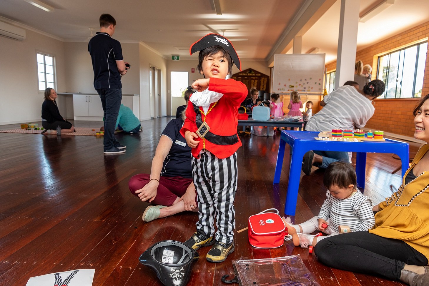 Child dressed up as a pirate enjoying imaginative play
