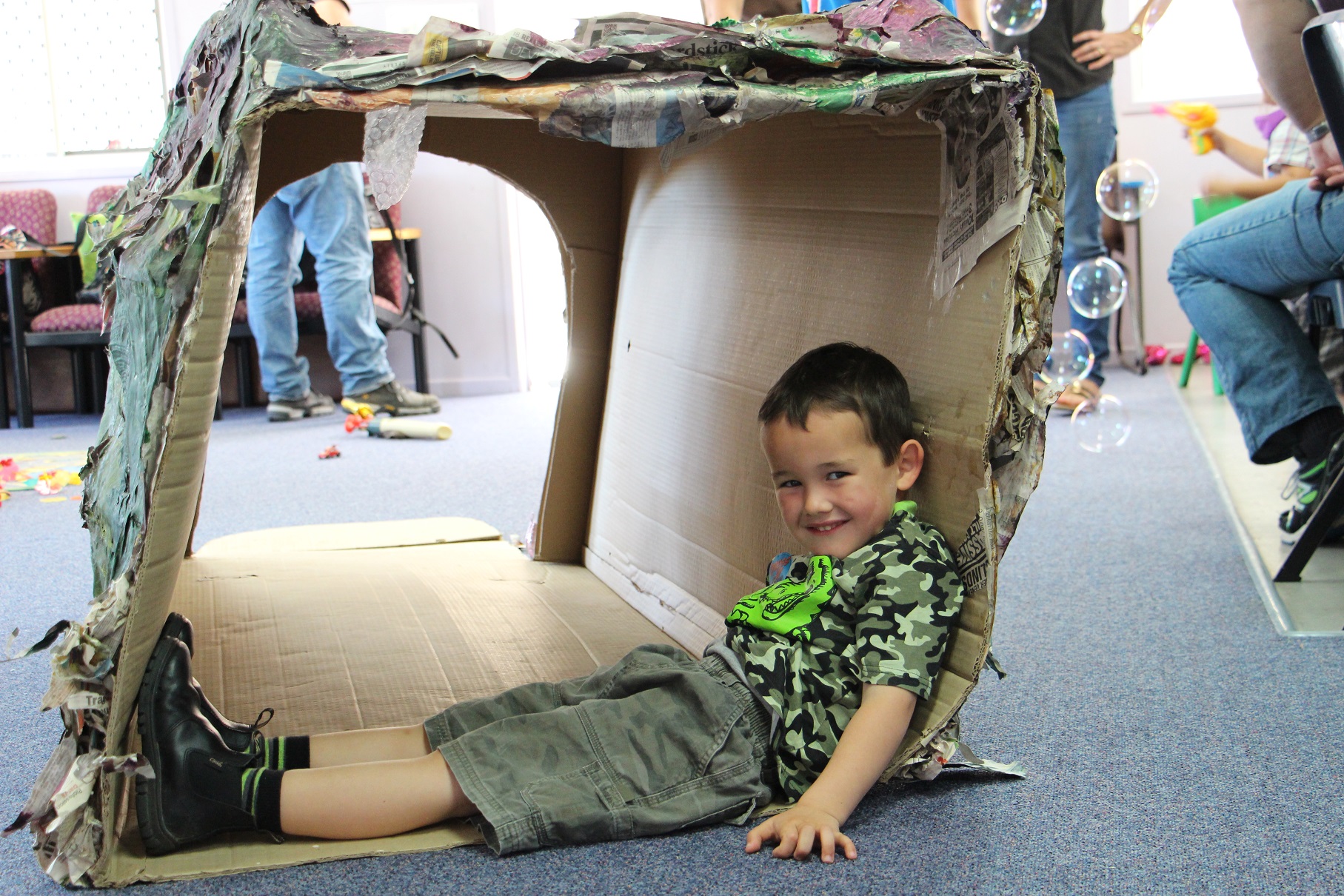 Child with recycled box