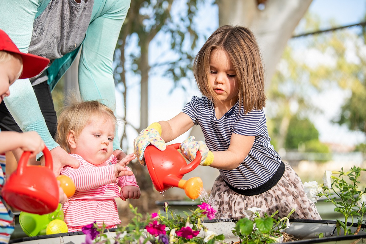 Girl with watering can