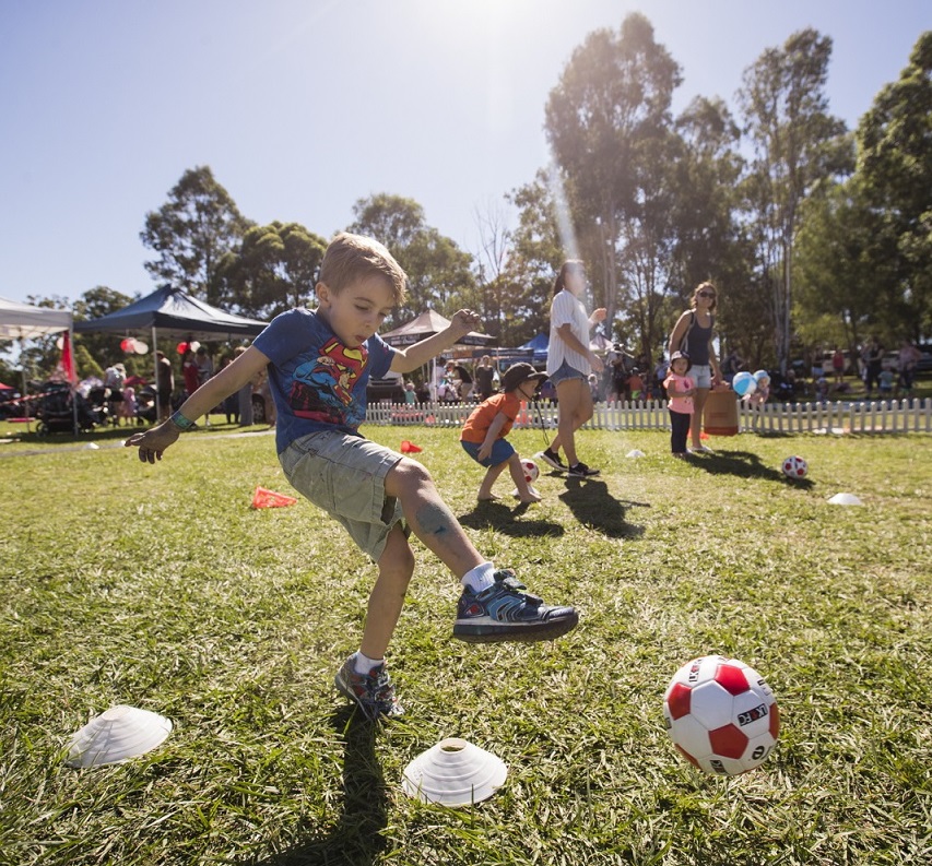 Boy kicking a ball